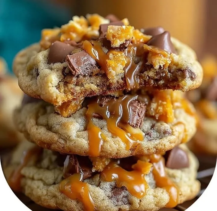 Image of Butterfinger Caramel Crunch Cookies with melted chocolate and caramel