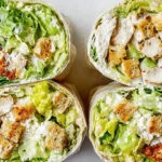 Four freshly prepared chicken Caesar salad wraps, showcasing vibrant ingredients, ideal as easy lunch ideas for work.